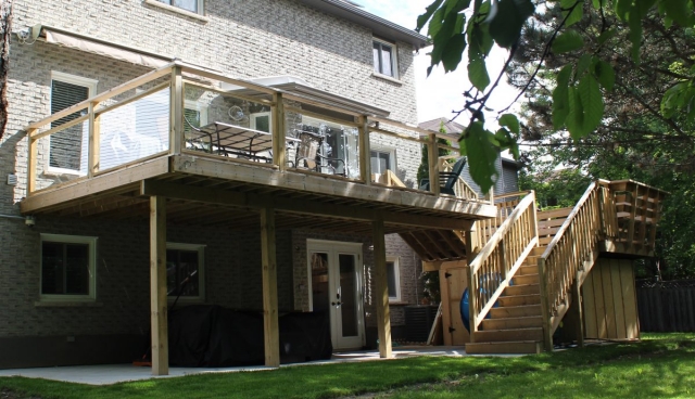 second story deck with glass railings